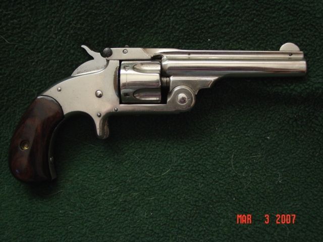 S&W Model .32 Single Action 
Early production, made in 1878.  I'd been told that this was a Model 1 1/2 but Roy Jinks from S&W set me straight.
